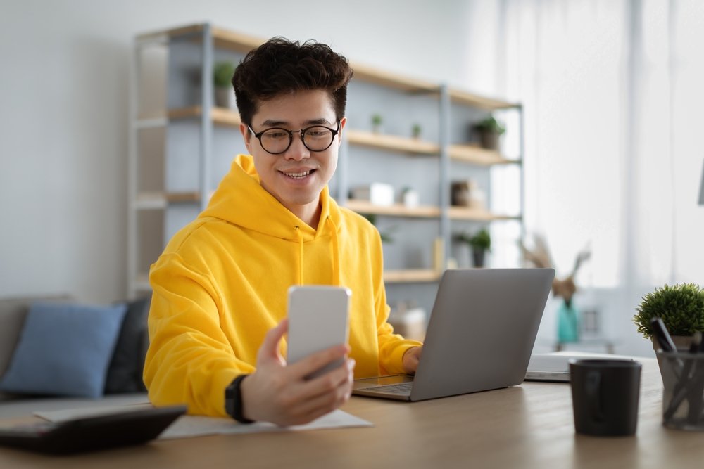 Wearing uncomfortable, warm formal clothing at the office